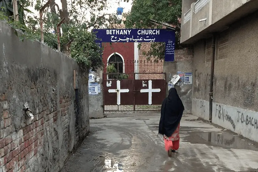Woman walking towards Bethany Church in Lahore