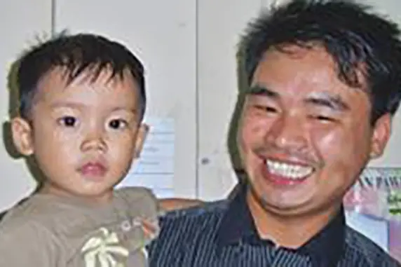 Mang Mang with his son